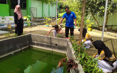 Inovasi Konservasi Air di Sekolah: Limbah Air Wudhu Dimanfaatkan untuk Kolam Ikan